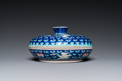A Chinese famille rose blue-ground spice box and cover for the Straits or Peranakan market, 19th C.