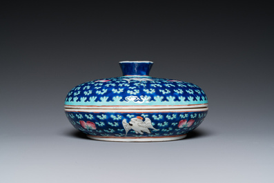 A Chinese famille rose blue-ground spice box and cover for the Straits or Peranakan market, 19th C.