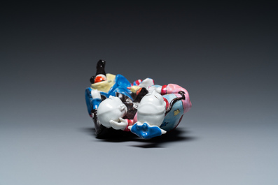 A Chinese famille rose 'ear cleaning' group, Qianlong