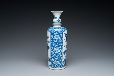 A Chinese blue and white rouleau vase with antiquities, Kangxi