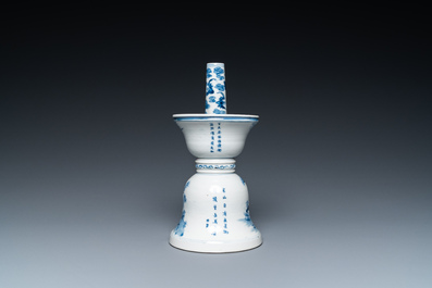 A Chinese blue and white 'Bleu de Hue' candlestick for the Vietnamese market, 18/19th C.