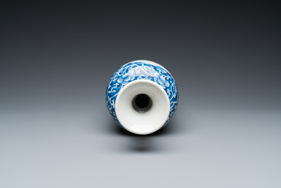 A Chinese blue and white rouleau vase with antiquities, Kangxi