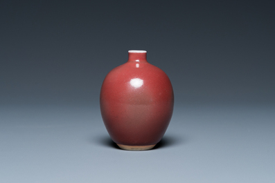 A small Chinese monochrome copper-red-glazed vase, Xuande mark, 19th C.