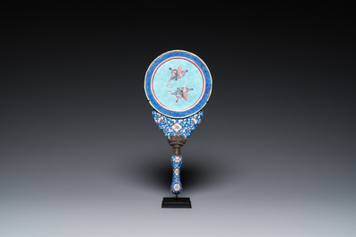 A Chinese Canton enamel hand mirror, inscribed 'Dan Na', Qianlong