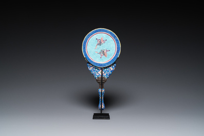 A Chinese Canton enamel hand mirror, inscribed 'Dan Na', Qianlong