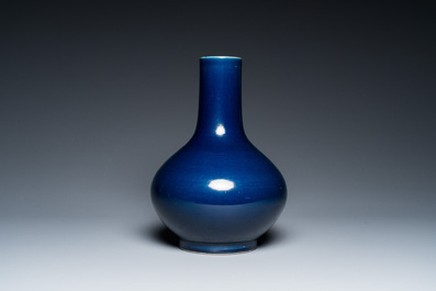 A Chinese monochrome 'sacrificial blue' bottle vase, 18/19th C.