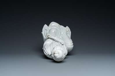 A Chinese Dehua blanc de Chine sculpture of Guanyin with a ruyi, Boji Yuren 博及漁人 mark, 19/20th C.
