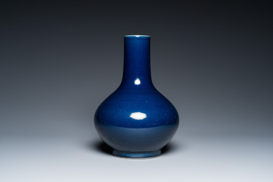 A Chinese monochrome 'sacrificial blue' bottle vase, 18/19th C.