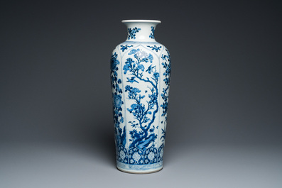 A large Chinese blue and white rouleau vase with floral design, Kangxi