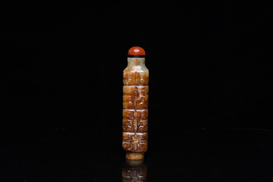 A Chinese celadon and russet jade 'cong' snuff bottle, probably Qing