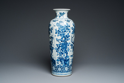 A large Chinese blue and white rouleau vase with floral design, Kangxi