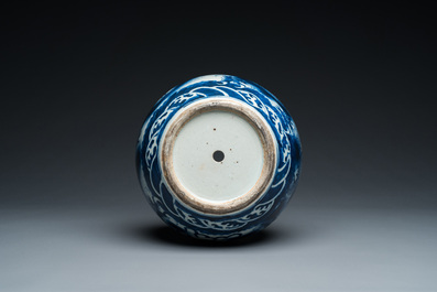 A Chinese blue and white 'dragons' bottle vase, 19th C.