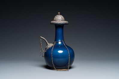 A Chinese monochrome blue-glazed kendi with silvered copper mounts, Qianlong