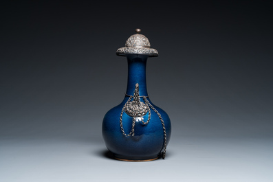A Chinese monochrome blue-glazed kendi with silvered copper mounts, Qianlong