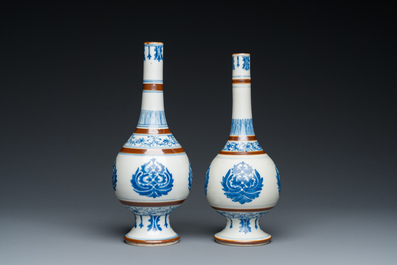 A pair of Chinese blue and white 'Baoxiang' sprinklers, Kangxi
