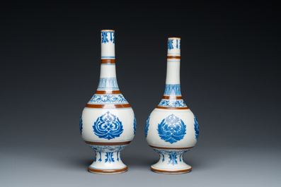 A pair of Chinese blue and white 'Baoxiang' sprinklers, Kangxi