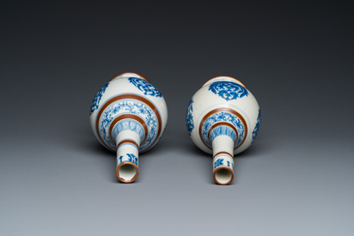 A pair of Chinese blue and white 'Baoxiang' sprinklers, Kangxi