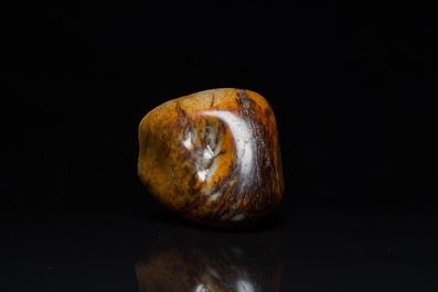 A Chinese hollowed jade libation cup on wooden stand, probably Qing