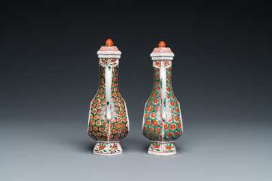 Two Chinese famille verte ewers and covers, Kangxi