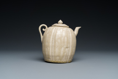 A Vietnamese beige-green-glazed melon-shaped ewer and cover, L&yacute;, 11/13th C.
