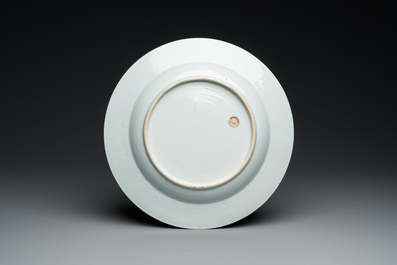 A Chinese famille rose armorial dish for the Dutch market with the arms of 'Tulleken', Qianlong