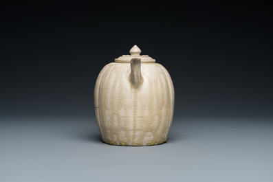 A Vietnamese beige-green-glazed melon-shaped ewer and cover, L&yacute;, 11/13th C.