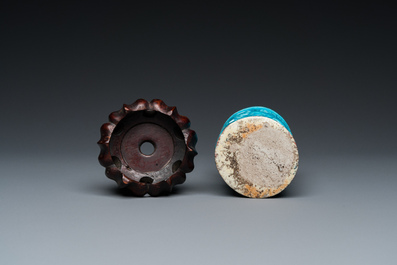 A Chinese reticulated monochrome turquoise brush pot on wooden stand, Qing