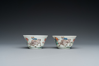 A pair of Chinese famille rose cups and saucers, Yongzheng