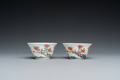 A pair of Chinese famille rose cups and saucers, Yongzheng