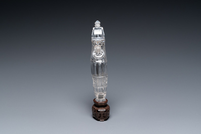 A Chinese rock crystal covered vase on wooden stand, 19/20th C.