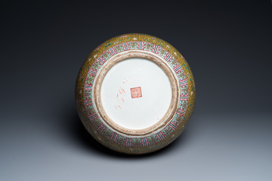 A large Chinese famille rose yellow-ground bottle vase, Qianlong mark, 19th C.