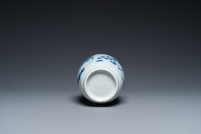 A Chinese blue and white vase with floral design, Transitional period