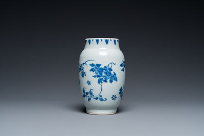 A Chinese blue and white vase with floral design, Transitional period