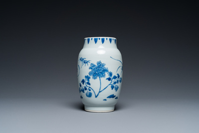 A Chinese blue and white vase with floral design, Transitional period
