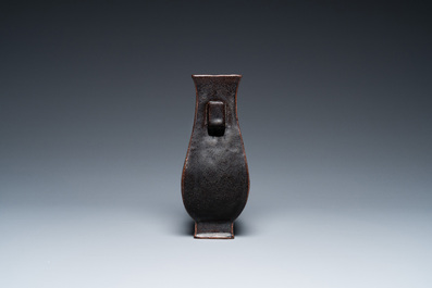 A Chinese monochrome dark aubergine-glazed 'fanghu' vase, probably Qianlong