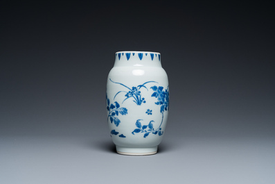 A Chinese blue and white vase with floral design, Transitional period