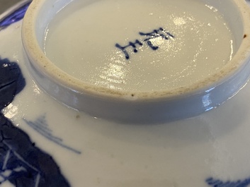 Three Chinese blue and white 'Bleu de Hue' bowls and two dishes for the Vietnamese market, 19th C.