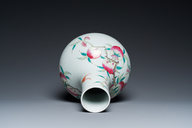 A Chinese famille rose 'nine peaches' bottle vase, 19th C.