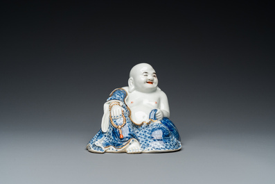 A Chinese blue and white seated Buddha, You Lin Ji Zao 游林記造 mark, Republic