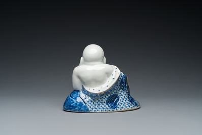 A Chinese blue and white seated Buddha, You Lin Ji Zao 游林記造 mark, Republic