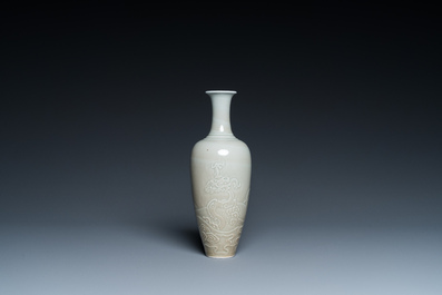 A Chinese celadon-glazed 'sea dragon' vase, Kangxi mark, 19/20th C.