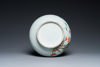 A Chinese famille rose 'nine peaches' bottle vase, 19th C.