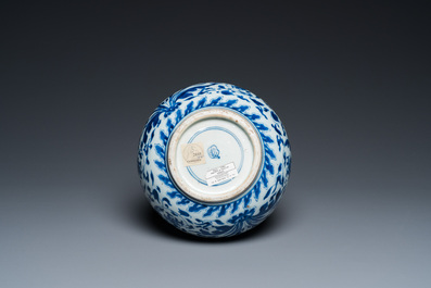 A Chinese blue and white bottle vase with floral design, Kangxi