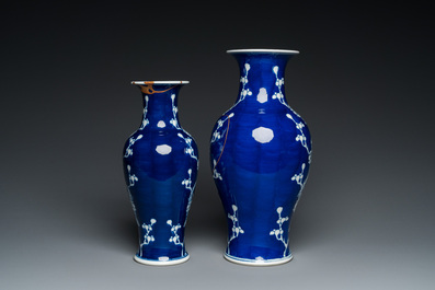 Two Chinese blue and white 'prunus' vases with kintsugi repairs, Qianlong mark, 20th C.