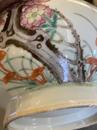 A Chinese famille rose 'nine peaches' bottle vase, 19th C.