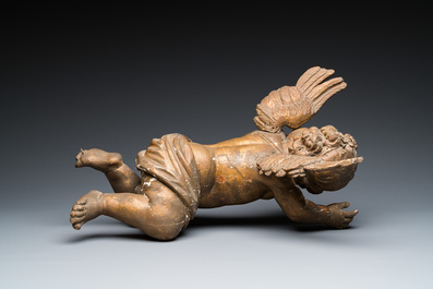 A pair of gilded wooden winged cherubs, probably Flanders, 1st half 18th C.