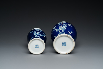 Two Chinese blue and white 'prunus' vases with kintsugi repairs, Qianlong mark, 20th C.