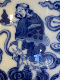 A Chinese blue and white 'eight immortals' bowl with silver handle, Qianlong mark and of the period
