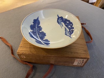 A fine Chinese blue and white 'leaf and scholar&rsquo;s rock' plate, Shunzhi