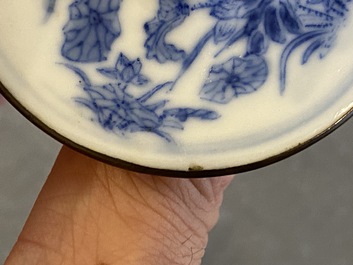 A pair of Chinese blue and white 'Bleu de Hue' candlesticks for the Vietnamese market, Kim Ngoc Cam Kee 金玉錦記 mark, 19th C.